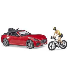 Bruder Roadster rot mit Rennrad und Fahrerin